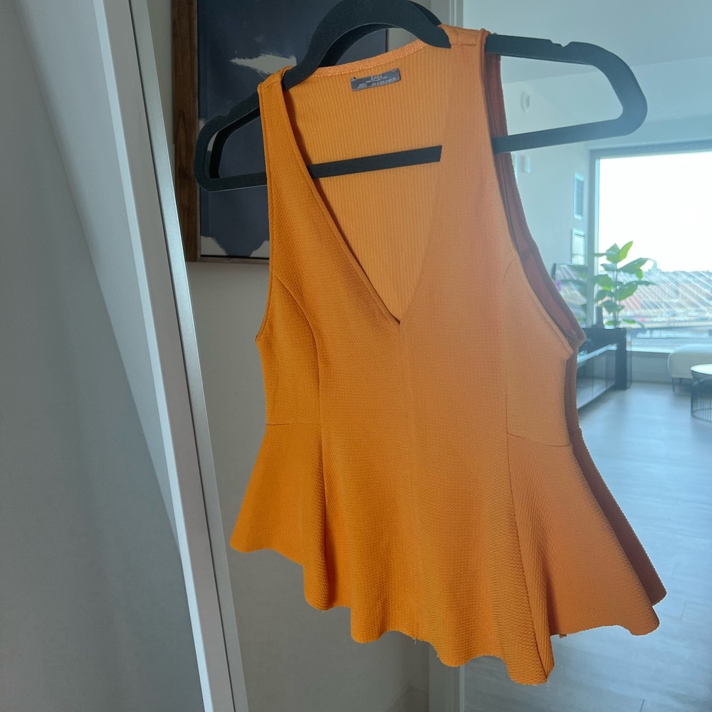 Peplum - Picture 2 of 3